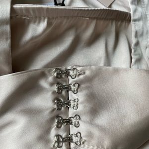 2 tops. Size S and M. Halter neckline with hook & eye closure. Brand new.